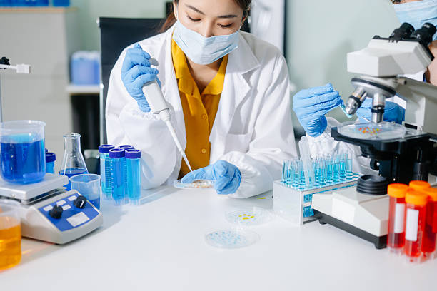istock Scientists, beakers, and microscopes in cutting-edge research. Perfect for science and technology projects. 2243904882