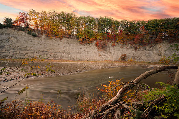 istock Long Exposure River at Sunset with Shale Cliff 2243908950