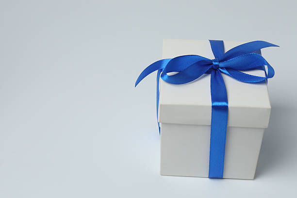 istock Gift boxes with ribbon, isolated on white background 2243911134