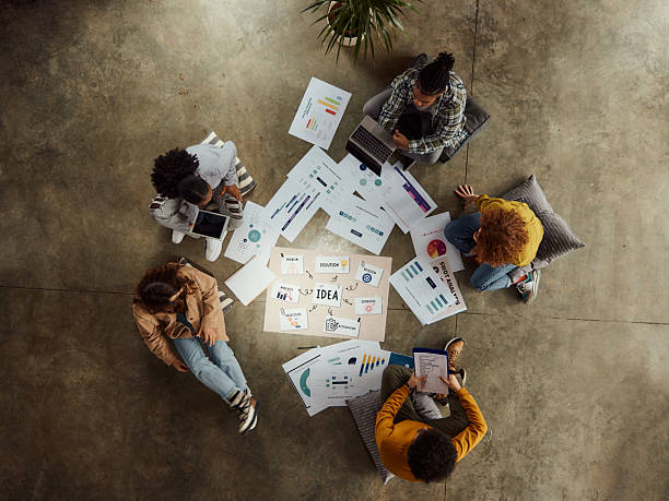 istock Above view of creative team working at casual office. 2243911721