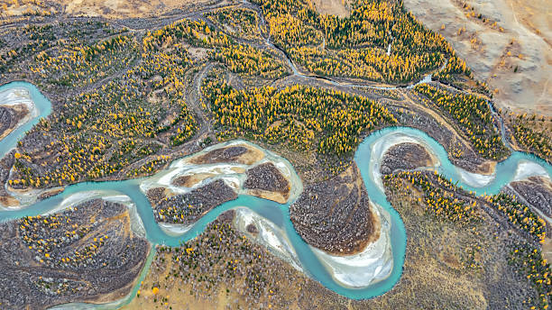 istock winding turquoise mountain river, aerial view. 2243914784