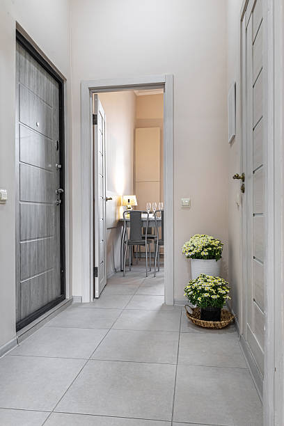istock Modern Entryway with Flowers and Open Door to Kitchen 2243916131