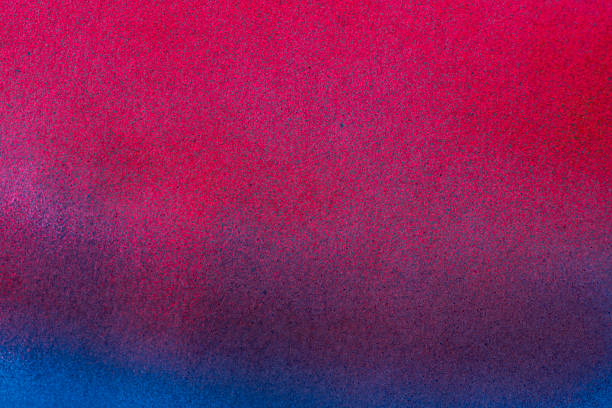 istock Red and blue spray paint background 2243917262