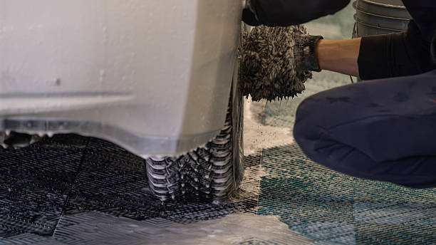 istock Hand car wash cleaning wheel with foam 2243920105