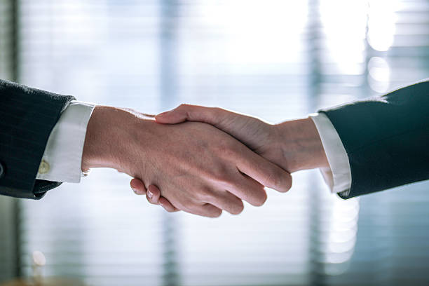 istock Business people shake hands when reaching a business agreement together. 2243924082