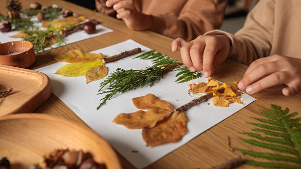 istock Children creating art with natural materials 2243924873