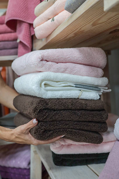 istock Stack of colorful fluffy towels in a shop 2243925330