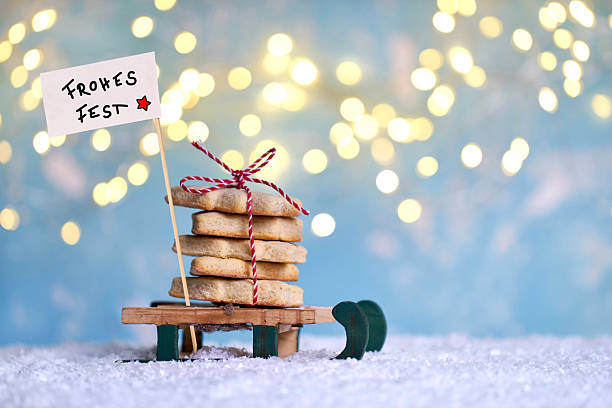 festive lights over christmas cookies on a sled