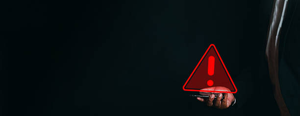 istock Risk Management Concept: Businessman Holding Red Warning Alert Icon with copyspace or freespace. 2243931046