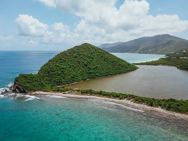 istock Tropical Beach with Clear Blue Water and Hills 2243933107