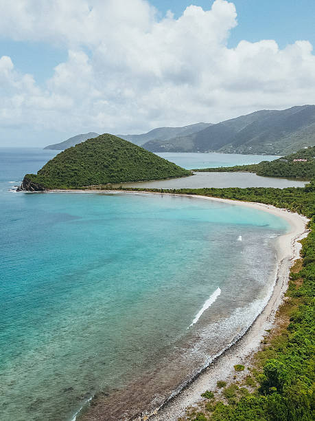 istock Tropical Beach with Clear Blue Water and Hills 2243933133