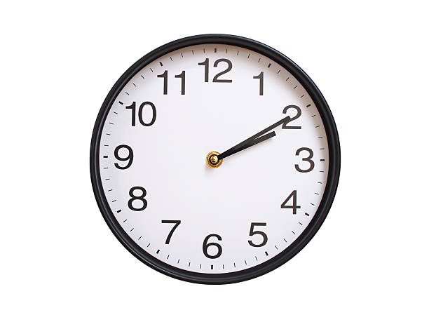 Round wall clock showing 02:10 or 14:10 isolated on white background. Concept of time, punctuality, deadline, or beginning of a new day.