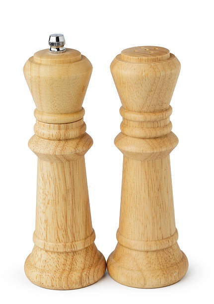 istock Wooden mills with salt and pepper on white 2243934260
