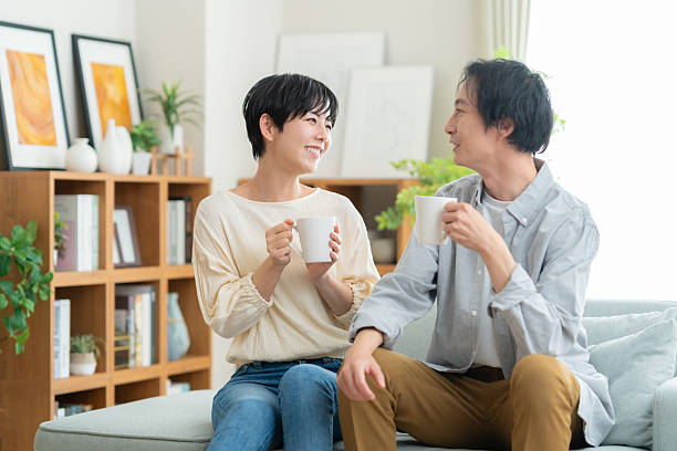 istock a young couple relaxing in a room 2243934648