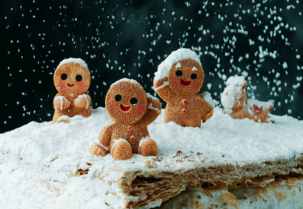 istock gingerbread men and reindeer in snow 2243934649
