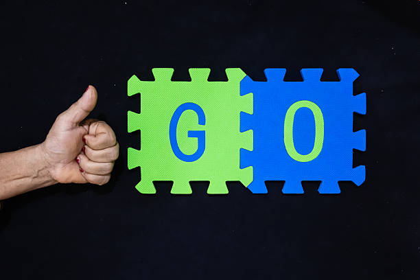 istock action and commencement word go on green and blue puzzle pieces 2243934873