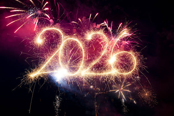 istock Sparkler Happy New Year 2026 with fireworks 2243935455