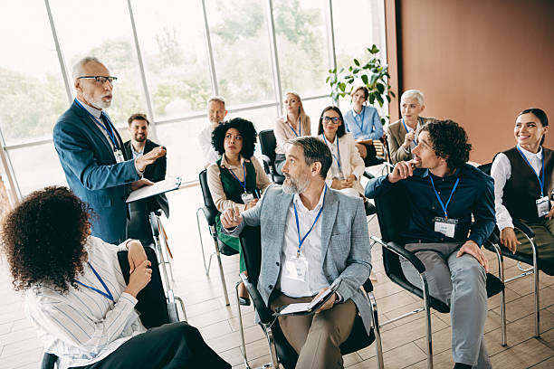 istock Team collaboration session with diverse professionals engaged in a corporate meeting in a modern office setting 2243935681