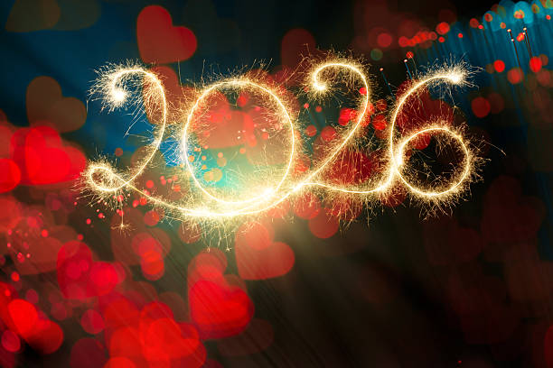 istock Sparkler Happy New Year 2026 With Defocused Hearts 2243935759