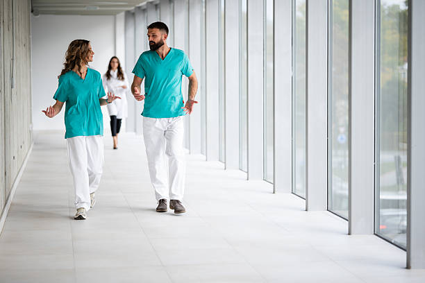 istock Medical staff collaborating in hospital corridor 2243938514