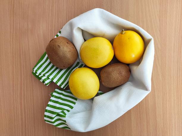 istock Yellow lemons and kiwi on the table 2243940970
