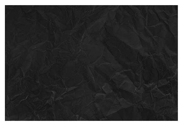 istock Black crumpled paper texture background. 2243941891