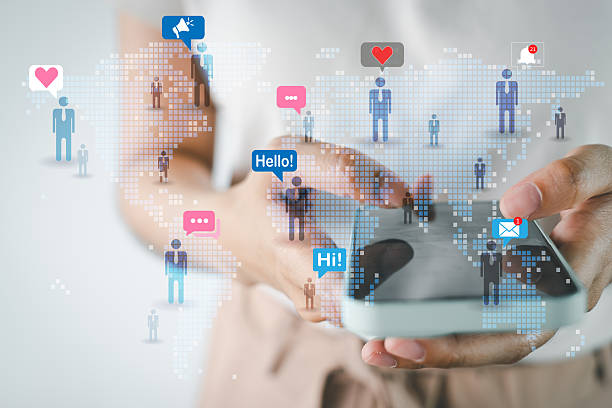 istock Global Social Media Connection: Hand Holding Smartphone with People Network and Communication Icons 2243942790