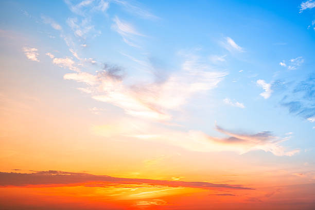 istock Beautiful , luxury soft gradient orange gold clouds and sunlight on the blue sky perfect for the background, take in evening,Twilight, Large size, high definition landscape photo 2243943544