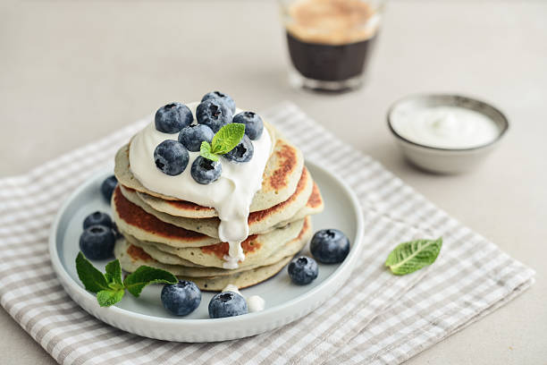 istock Plate blueberry pancakes with sour cream 2243944612