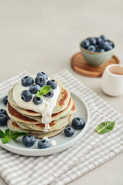 istock Plate blueberry pancakes with sour cream 2243944622