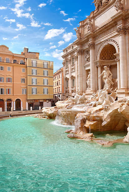 Lonely tourist taking selfie at Trevi Fountain in Rome