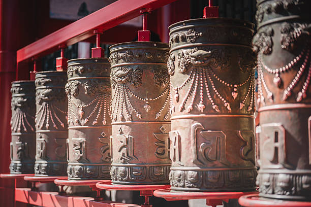 Red-lacquered gates frame a symmetrical courtyard within Beijing's Prince Kung's Palace Museum, showcasing grandeur.