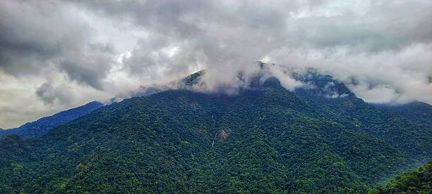 istock LUSH GREEN MOUNTAINS WRAPPED IN CLOUDS 2243954851
