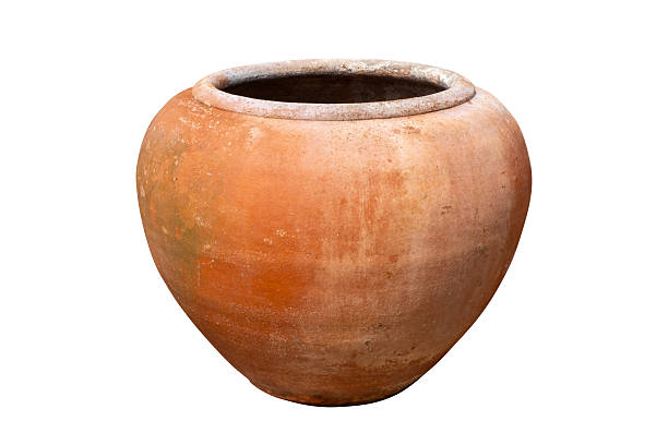 istock Old terracotta water jar isolated on white background with clipping path. Traditional clay pottery used for water storage or garden decoration, showing rustic texture and natural earthy color. 2243956411