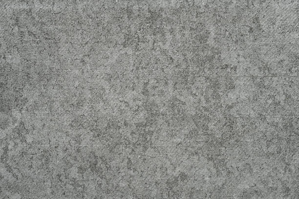 istock Gray asbestos cement slate wall texture background with subtle horizontal lines. 2243959958