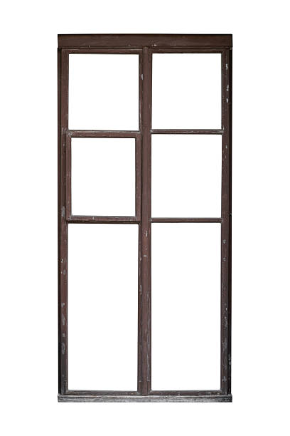 istock Old brown tall wooden window frame with six sections is isolated. 2243959982