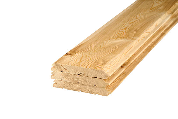 istock Stack of smooth, light-colored wooden planks showcasing natural grain patte.. 2243961043