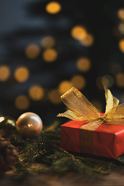 istock Christmas gift with festive background 2243961593