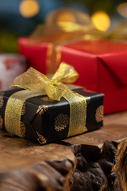 istock Christmas gift box with festive lights 2243964210