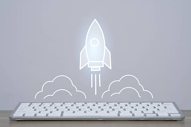 Rocket icon launching above keyboard symbolizes startup, innovation, digital business growth, and technology development ideal for representing tech ideas, online marketing creative digital strategy.