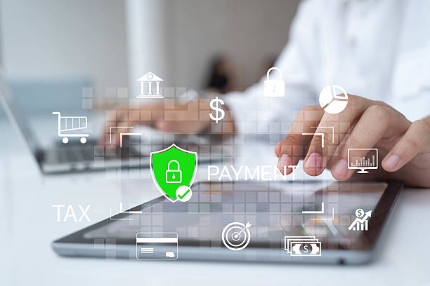 istock Secure online payment concept with woman using tablet and laptop, showing digital transaction, mobile banking, e-commerce, financial technology, data security, and modern business innovation. 2243967054