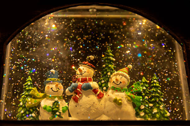 Xmas decor and Christmas lights on a festive snow globe