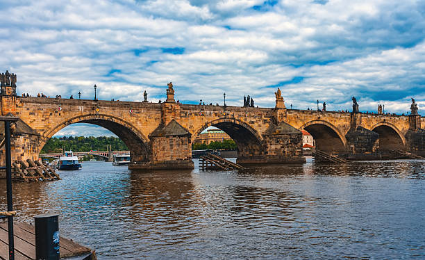 istock Iconic Charles Bridge Stone Arches Over Vltava River. 2243970212