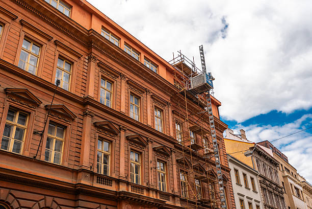 istock Historic Building Renovation Scaffoldings and Construction Hoist. 2243970284
