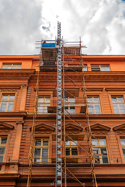 istock Historic Building Renovation Scaffoldings and Construction Hoist. 2243970285