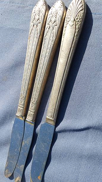 istock Old silver knives. Antique. 2243972403