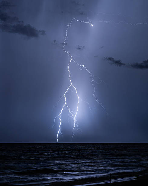 istock Tropical Lightning Storm Over the Ocean 2243973282