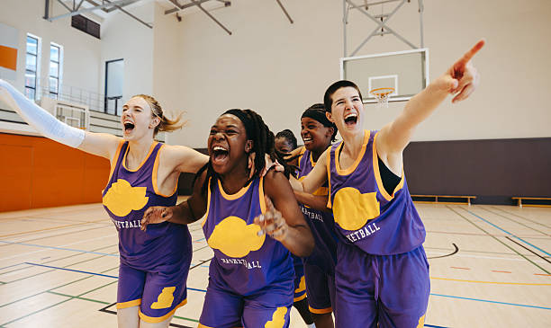 istock Victory secured: Female team erupts in joy after final buzzer 2243975715