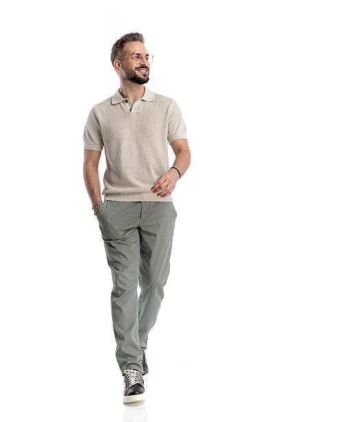 istock bearded casual man with glasses walking and looking to side 2243981826