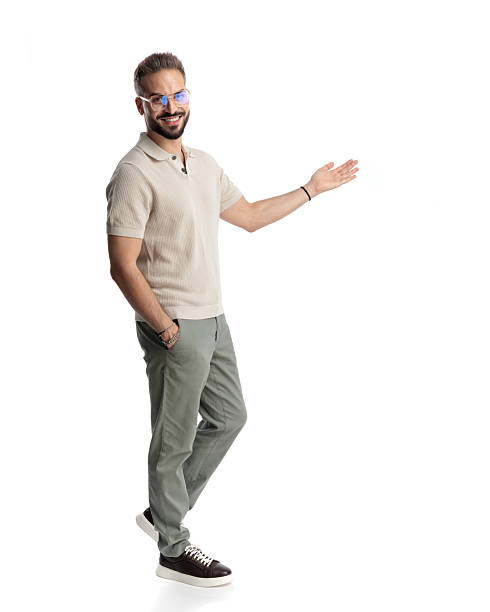 istock side view of handsome man with glasses presenting to side and smiling 2243982778